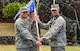 Lt. Col. Phillip Verroco, 21st Space Operations Squadron commander, takes the detachment flag from Maj. Robert F. Shumaker, Detachment 3 outgoing commander, during the Detachment 3 Change of Command Ceremony, Kaena Point, Hawaii, June 9, 2017.  Detachment 3 is a component of the 21st Space Operations Squadron, 50th Network Operations Group, 50th Space Wing, and is located on the western tip of Oahu.  It is the oldest and one of seven worldwide remote tracking stations in the Air Force Satellite Control Network.  (U.S. Air Force photo by Tech. Sgt. Heather Redman)