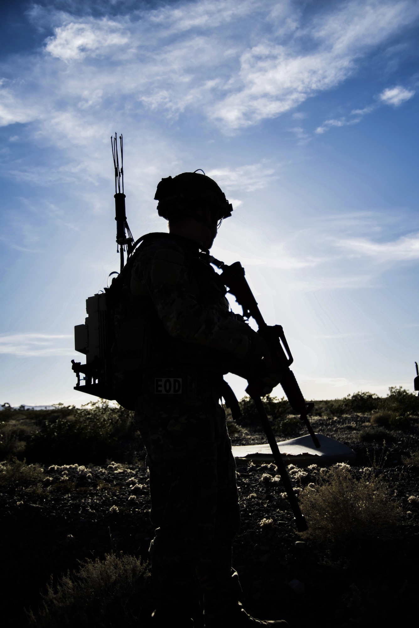 Senior Airman William Butler, 99th Civil Engineer Squadron explosive ordnance disposal technician, provides security during a training exercise at the Nevada Test and Training Range June 7, 2017. The training exercise placed EOD teams in night and day scenarios to locate and defeat simulated explosives. (U.S. Air Force photo by Airman 1st Class Andrew D. Sarver/Released)