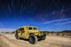 A 99th Civil Engineer Squadron explosive ordnance disposal team Humvee sits under the stars during a training exercise at the Nevada Test and Training Range June 7, 2017. The Humvee is the military’s premier light armored truck and has multiple modifications that best suits each unit’s specific needs. (U.S. Air Force photo illustration by Airman 1st Class Andrew D. Sarver/Released)