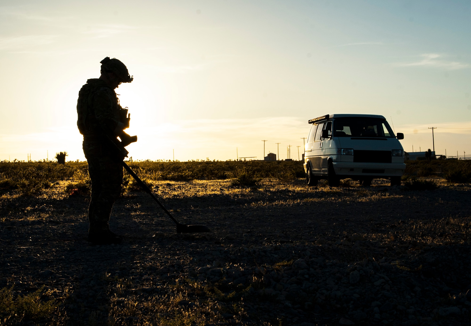 Tech Sgt. Nathaniel Jackson, 99th Civil Engineer Squadron explosive ordnance disposal technician, performs a roadside bomb clearing operation during a training event June 7, 2017 on the Nevada Test and Training Range. EOD Airmen support ground and air operations through the detection, identification, neutralization and disposal of hazardous explosives. (U.S. Air Force photo by Senior Airman Joshua Kleinholz)