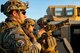 Explosive ordnance disposal technicians assigned to the 99th Civil Engineer Squadron, Nellis Air Force Base, Nev., discuss tactics during a roadside bomb clearing training exercise June 7, 2017 on the Nevada Test and Traingin Range. Identifying and defeating an explosive threat is a team effort, requiring constant communication between team members. (U.S. Air Force photo by Senior Airman Joshua Kleinholz/Released)