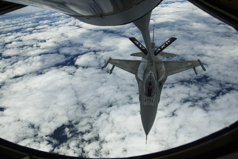 A Polish air force F-16 Fighting Falcon refuels from a KC-135R Stratotanker, 100th Air Refueling Wing, over Latvia, June 14, 2017. The exercise is designed to enhance flexibility and interoperability, to strengthen combined response capabilities, as well as demonstrate resolve among Allied and Partner Nations' forces to ensure stability in, and if necessary defend, the Baltic Sea region. (U.S. Air Force photo by Staff Sgt. Jonathan Snyder)
