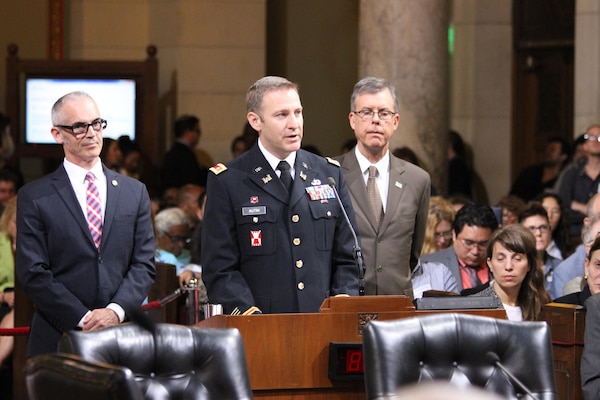 Maj. Scotty Autin, deputy commander of the LA District, addressed the council members and public who filled the council chambers June 8. Members of the U.S. Army Corps of Engineers Los Angeles District joined City of Los Angeles Councilmember Mitch O’Farrell (L) and his staff in recognizing the collaborative efforts to improve, preserve and revitalize the Los Angeles River during a special City Council presentation City Hall June 8.