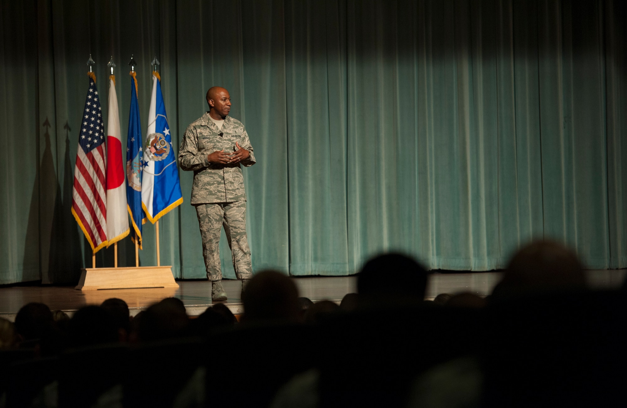 Chief Master Sgt. of the Air Force Kaleth O. Wright speaks with members of the 18th Wing June 12, 2017, at Kadena Air Base, Japan. Wright conducted his CMSAF Town Hall for more than 900 enlisted, officers, civilians and spouses of the 18th Wing and its partner unit where he addressed his command priorities, mission vision and the importance of Kadena and its Airmen. (U.S. Air Force photo by Senior Airman Quay Drawdy)