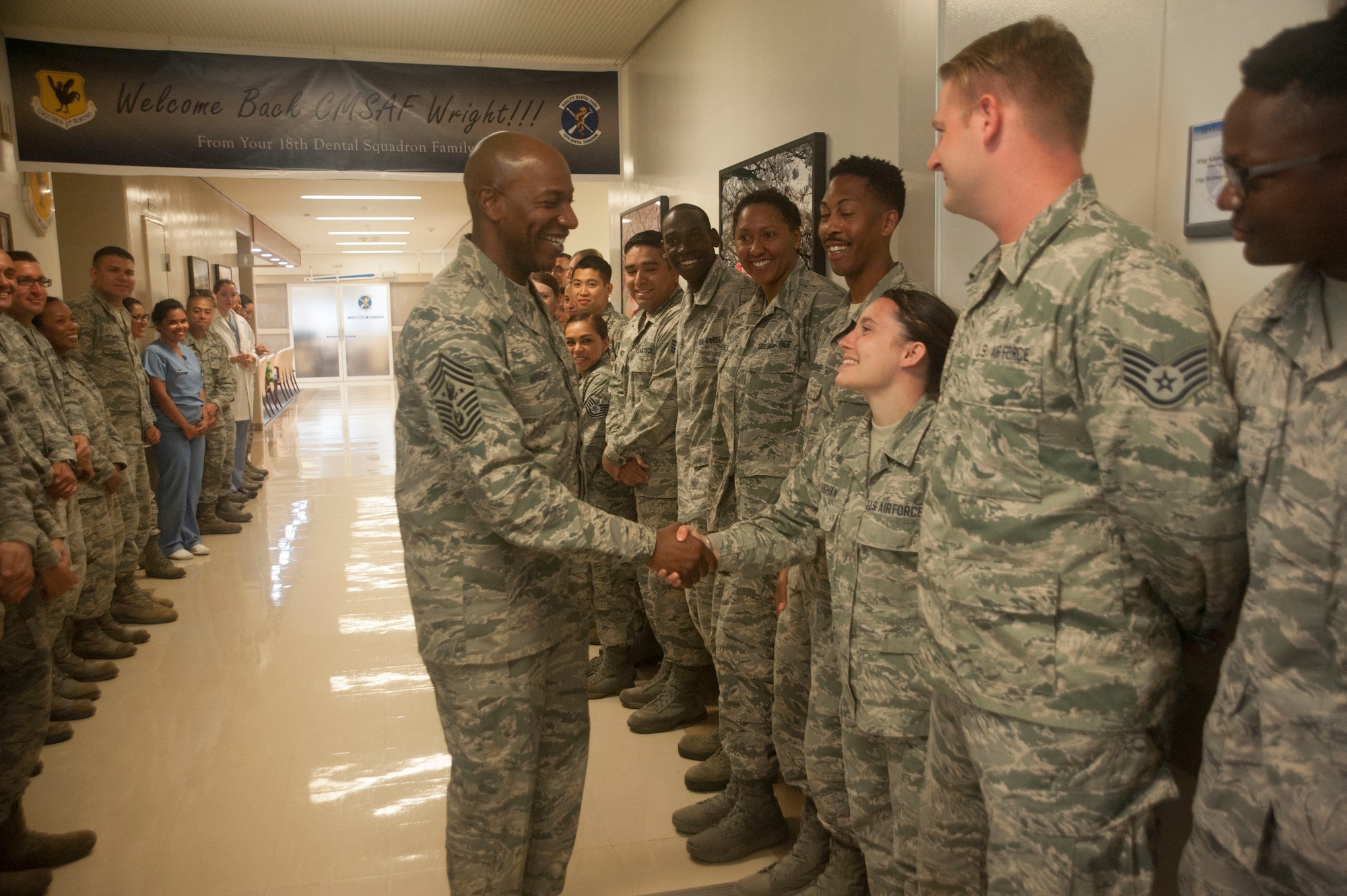 Chief Master Sgt. of the Air Force Kaleth O. Wright shakes hands with members of the 18th Medical Group June 12, 2017, at Kadena Air Base, Japan. Airmen had the opportunity to speak with Wright during his stay at Kadena. Discussions included base personnel's work performance and accomplishments. (U.S. Air Force photo by Senior Airman Quay Drawdy)