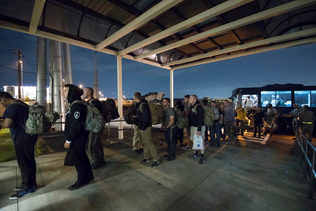 U.S. Army Solders wait for Noncombatant Evacuation Operations tracking system (NTS) processing at Yokota Air Base, Japan, June 6, 2017, during exercise Focused Passage 2017. Eighth Army conducts Noncombatant Evacuation Operations administrative and training tasks designed to inspect NEO packets, conduct NEO representative/warden training, NEO tracking system (NTS) operator training, and account for all Department of Defense noncombatants. (U.S. Air Force photo by Yasuo Osakabe)