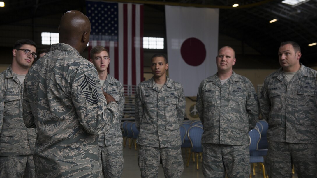 Chief Master Sgt. of the Air Force Kaleth O. Wright addresses Airmen assigned to the 374th Airlift Wing during his visit, June 13, 2017, at Yokota Air Base, Japan. Wright highlighted the importance of Yokota’s airlift mission throughout the Indo-Asia Pacific region. (U.S. Air Force photo by Airman 1st Class Juan Torres)
