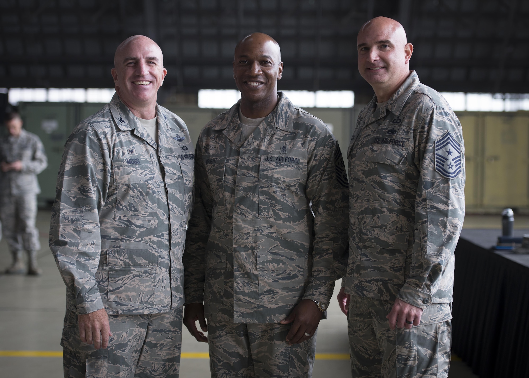 From left, Col. Kenneth E. Moss, 374th Airlift Wing commander, Chief Master Sgt. of the Air Force Kaleth O. Wright and Chief Master Sgt. Christopher M. Yevchak, 374 AW command chief master sergeant, pose for a photo, June 13, 2017, at Yokota Air Base, Japan. Together, they highlighted the importance of Yokota’s airlift mission throughout the Indo-Asia Pacific region. (U.S. Air Force photo by Airman 1st Class Juan Torres)