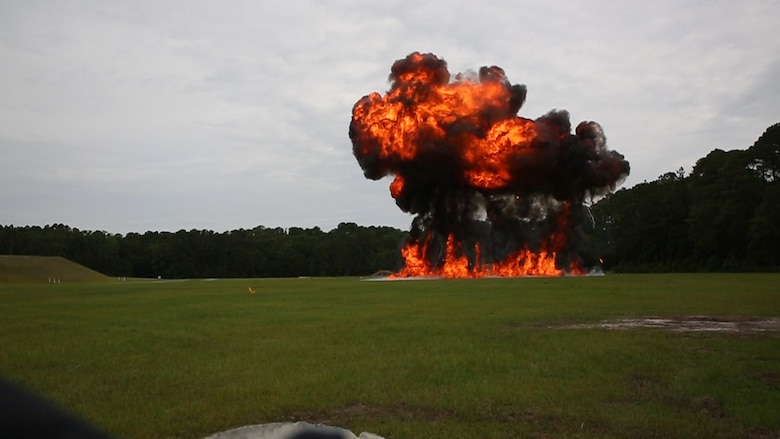 'The  wall  of  fire’  pyrotechnic  display  detonates  during  a  demolition  exercise  at  the  Explosive  Ordnance  Range  aboard  Marine  Corps  Air  Station  Beaufort,  June  1.  The  MCAS Beaufort EOD Marines created the pyrotechnic display by detonating four-gallon bags of fuel laid out along a detonation cord. The MCAS Beaufort EOD Marines conducted  the  demolition  exercise  to  detonate  unused  explosives  from  the  2017  MCAS Beaufort Air Show using the opportunity to practice for future air shows.
