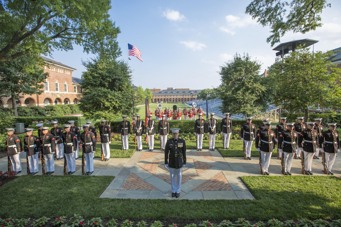 U.S. Marines with Marine Barracks Washington stand at the position of attention, Washington, D.C., June 14, 2017. Commandant of the Marine Corps Gen. Robert B. Neller hosted Lt. Gen. Angus J. Campbell, chief of the Australian Army, for an honors ceremony and dinner.