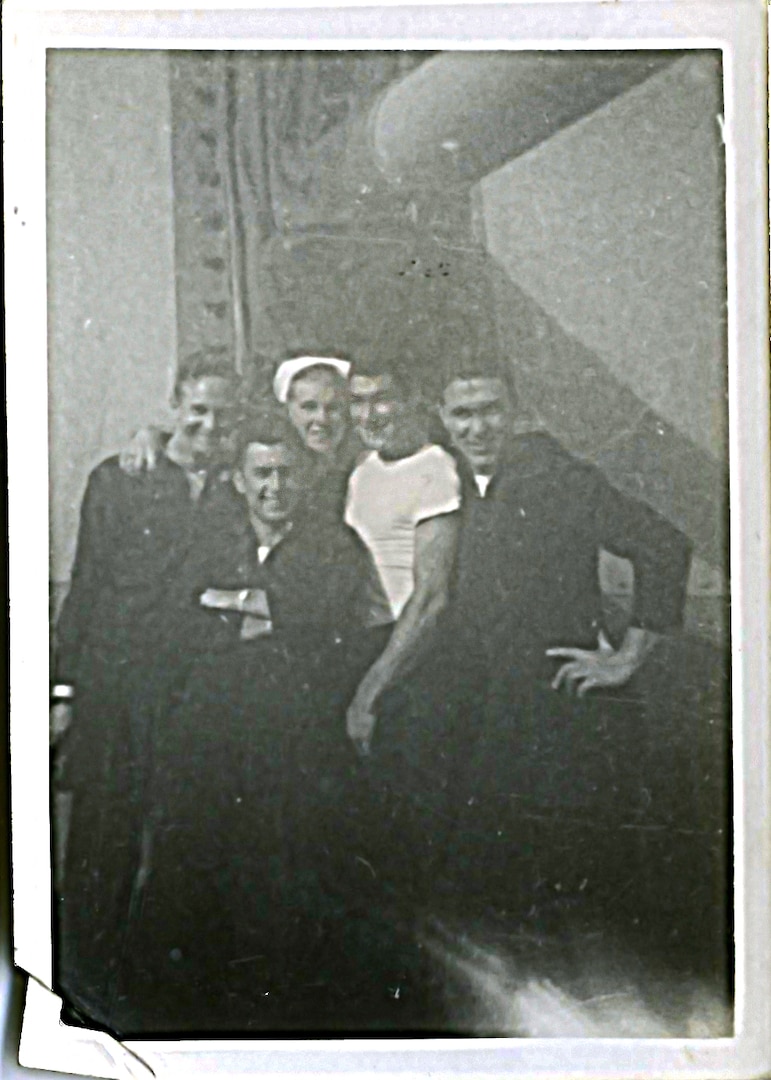 Navy Gunner's Mate Ernie Schramm poses for a group photo with fellow Sailors during World War II.