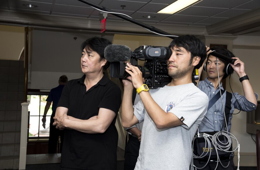 A news crew member from the Nippon Hoso Kyokia (Japan Broadcasting Corporation) films Air University Headquarters at Maxwell Air Force Base, Ala., June 15, 2017.
The film will be used for an upcoming documentary about the Air Corps Tactical School, which was located at Maxwell from 1931 to 1942 and played a major role in the Allied air domination over Japan during WWII. The NHK crew visited Maxwell in December 2016 for their documentary about a group whose mission was to protect and salvage works of art during WWII. The NHK has an average viewership of 11 million. (U.S. Air Force photo/Senior Airman Alexa Culbert) 
