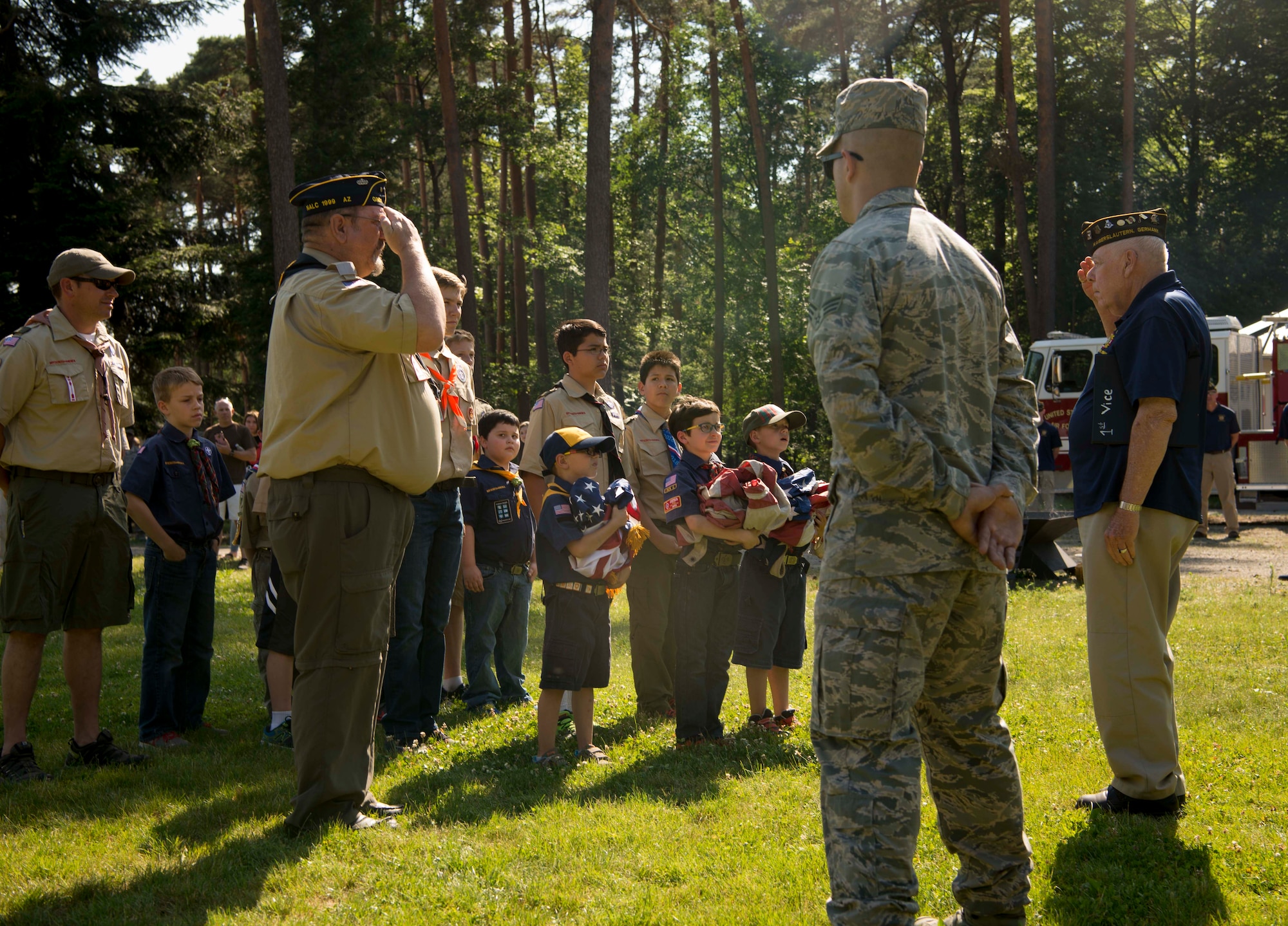 Children of Ramstein personnel who are members of the Boy Scouts of America and Cub Scouts of America stand in formation for flag inspection during a Flag Day flag disposal ceremony on Ramstein Air Base, Germany, June 14, 2017. Flag Day commemorates the day the U.S. adopted its flag, June 14, 1777. The disposal ceremony, conducted to give proper respect to flags during their disposal, invited participants and audiences to take a moment of appreciation for the pride and heritage the U.S. flag carries. (U.S. Air Force photo by Senior Airman Elizabeth Baker.)