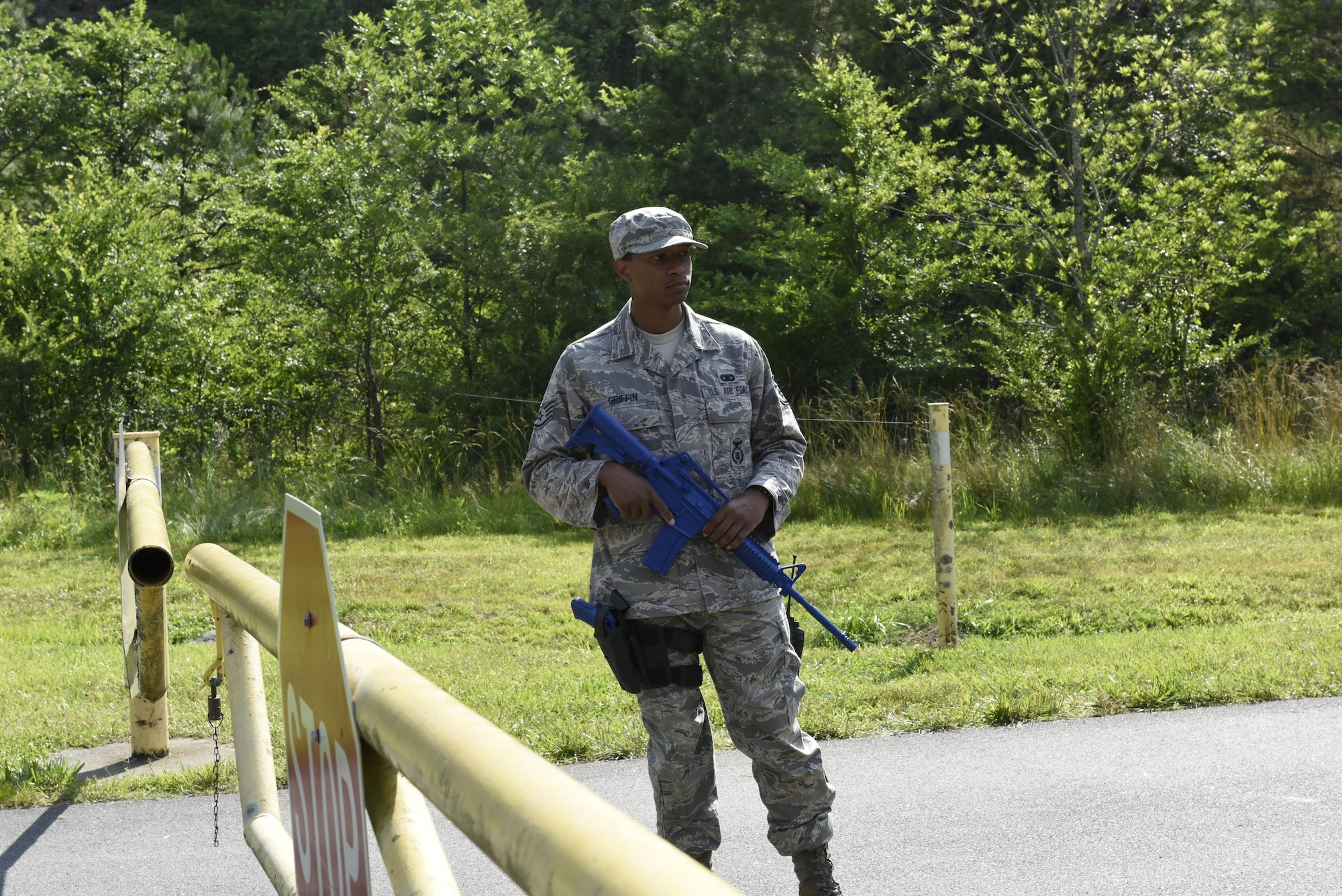 U.S. Air Force Staff Sgt. Brandon Griffin of the 145th Airlift Wing Security Forces, guards a checkpoint durng and scenario of Vigilant Catamount, an interagency domestic exercise between local, state, and military personnel in North Carolina, in the mountains of Fontana Dam North Carolina, June 12, 2017. Vigilant Catamount is a multi-day exercise testing emergency response, with the second phase involving a terrorist bomb threat to Fontana Dam.
