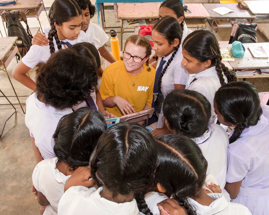 Navy Petty Officer 3rd Class Shayne Jones interacts with students at the Kalutara-Molkawa School near Kalutara, Sri Lanka, June 15, 2017, during a community engagement event in support of humanitarian assistance operations in the wake of severe flooding. Jones is a machinist mate. Navy photo by Petty Officer 2nd Class Joshua Fulton