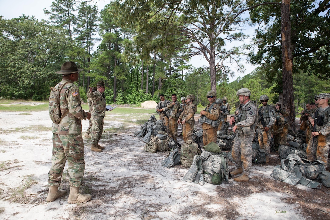Sgt. 1st Class Charles Jones, a drill sergeant with C Company 1st Battalion, 354th infantry Regiment, 95th Training Division, gives a safety briefing to Warriors before zeroing their M4 rifle, at the 2017 U.S. Army Reserve Best Warrior Competition at Fort Bragg, N.C., June 13. This year's Best Warrior Competition will determine the top noncommissioned officer and junior enlisted Soldier who will represent the U.S. Army Reserve in the Department of the Army Best Warrior Competition later this year at Fort A.P. Hill, Va. (U.S. Army Reserve photo by Lisa Velazco) (Released)