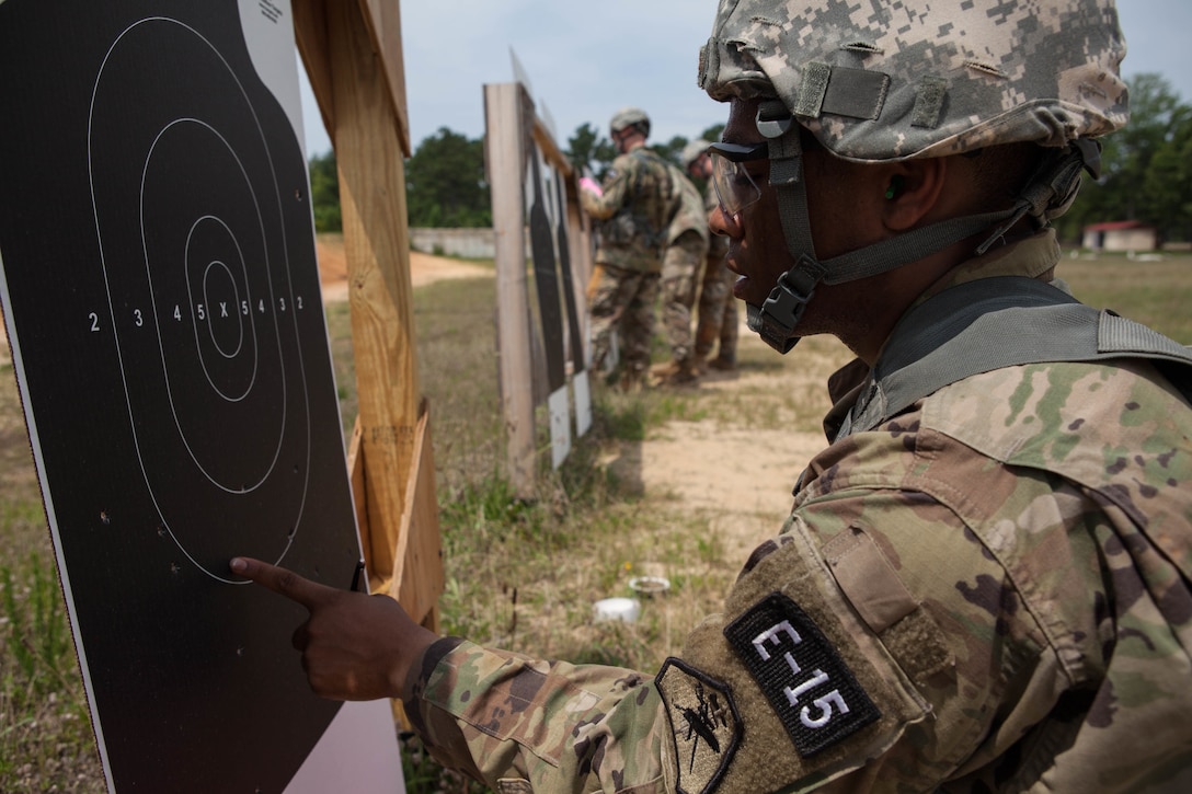 Pfc. Andrew Green, with the 6th Legal Operations Detachment, scores another Warrior's target at the 2017 U.S. Army Reserve Best Warrior Competition at Fort Bragg, N.C., June 13. This year's Best Warrior Competition will determine the top noncommissioned officer and junior enlisted Soldier who will represent the U.S. Army Reserve in the Department of the Army Best Warrior Competition later this year at Fort A.P. Hill, Va. (U.S. Army Reserve photo by Lisa Velazco) (Released)