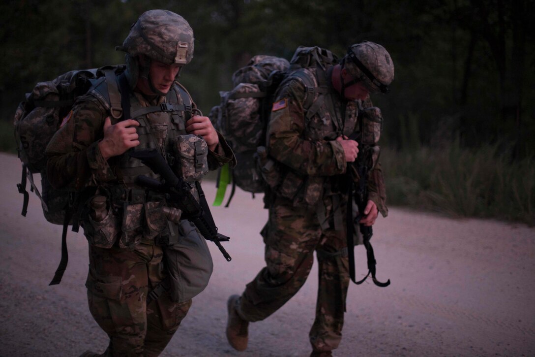 Warriors competes in Foot March, at the 2017 U.S. Army Reserve Best Warrior Competition at Fort Bragg, N.C., June 13. This year's Best Warrior Competition will determine the top noncommissioned officer and junior enlisted Soldier who will represent the U.S. Army Reserve in the Department of the Army Best Warrior Competition later this year at Fort A.P. Hill, Va. (U.S. Army Reserve photo by Spc. Jesse L. Artis Jr.) (Released)