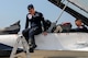 Thunderbird 8 Capt. Erik Gonsalves, the advance pilot and narrator for the U.S. Air Force Thunderbirds, disembarks his aircraft as Tech. Sgt. Michael Radcliff, a tactical aircraft maintainer, waits to egress, June 14, 2017. The pair performed an aerial survey of YARS and the surrounding area before landing. The U.S. Air Force Thunderbirds demonstration team is scheduled to perform at Thunder Over the Valley Air Show, June 17-18. (U.S. Air Force photo/Senior Airman Joshua Kincaid)