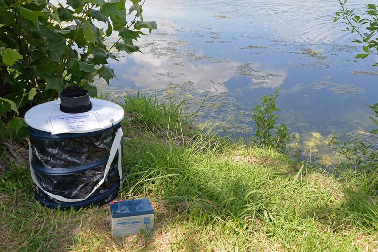 A mosquito trap, set by the Medical Operations Squadron Public Health Office, sits by the pond at Leaning Pines Golf Course at Laughlin Air Force Base, June 14, 2017.  The mosquito traps are used to test the insects for the Zika Virus, and should not be moved or touched. (U.S. Air Force photo/Airman 1st Class Daniel Hambor)
