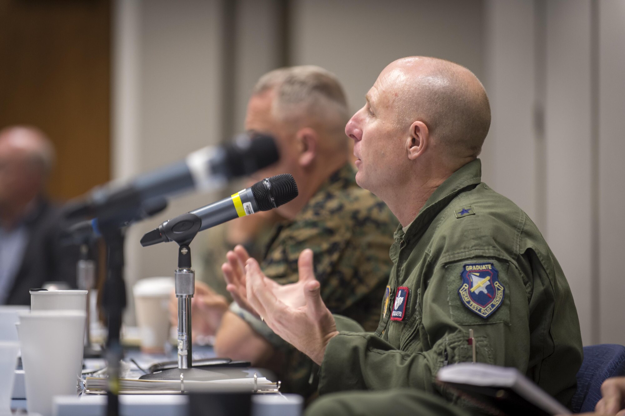 Brig. Gen. Carl Schaefer, 412th Test Wing commander, speaks to the audience at this year’s Mojave Commanders’ Summit held June 7 at the Airman and Family Readiness Center. The summit provides a forum for military commanders around the Mojave Desert in California to exchange ideas and resolve issues affecting military operations within the region, according to its charter. (U.S. Air Force photo by Kyle Larson)