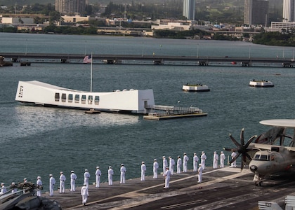 Sailors man the rails as Nimitz-class aircraft carrier USS Carl Vinson (CVN 70) prepares to pull into Joint Base Pearl Harbor-Hickam for a scheduled port visit, June 14, 2017. The U.S. Navy has patrolled the Indo-Asia-Pacific routinely for more than 70 years promoting regional peace and security. 