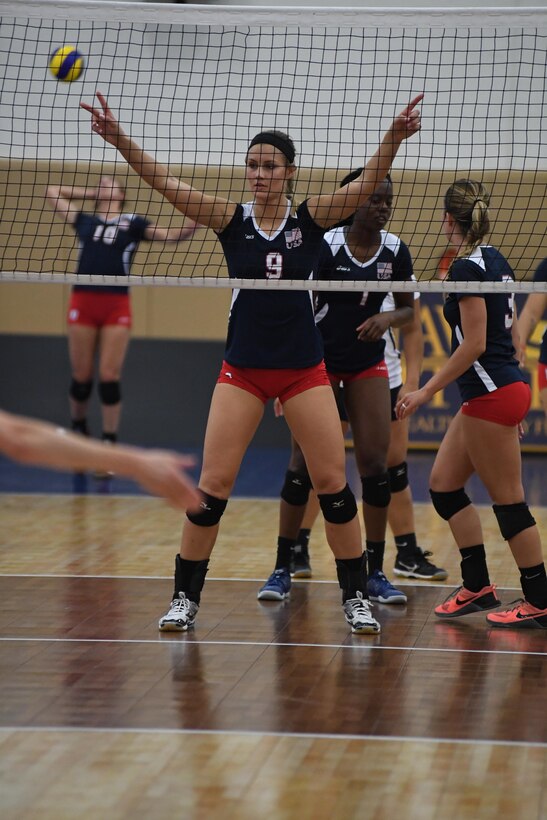 Army 1st Lt. Megan Wilton of the U.S. Armed Forces Women's Volleyball guards the net as USA defeats Netherlands 3-0 (25-11, 25-14, 25-9) in match eight of the 18th Conseil International du Sport Militaire (CISM) World Women’s Volleyball Military Championship on 7 June 2017 at Naval Station Mayport, Florida.  USA will face China in the finals on Friday, June 9th here at the Mayport Fitness Center. (Photo by Petty Officer Timothy Schumaker, NPASE Southeast)