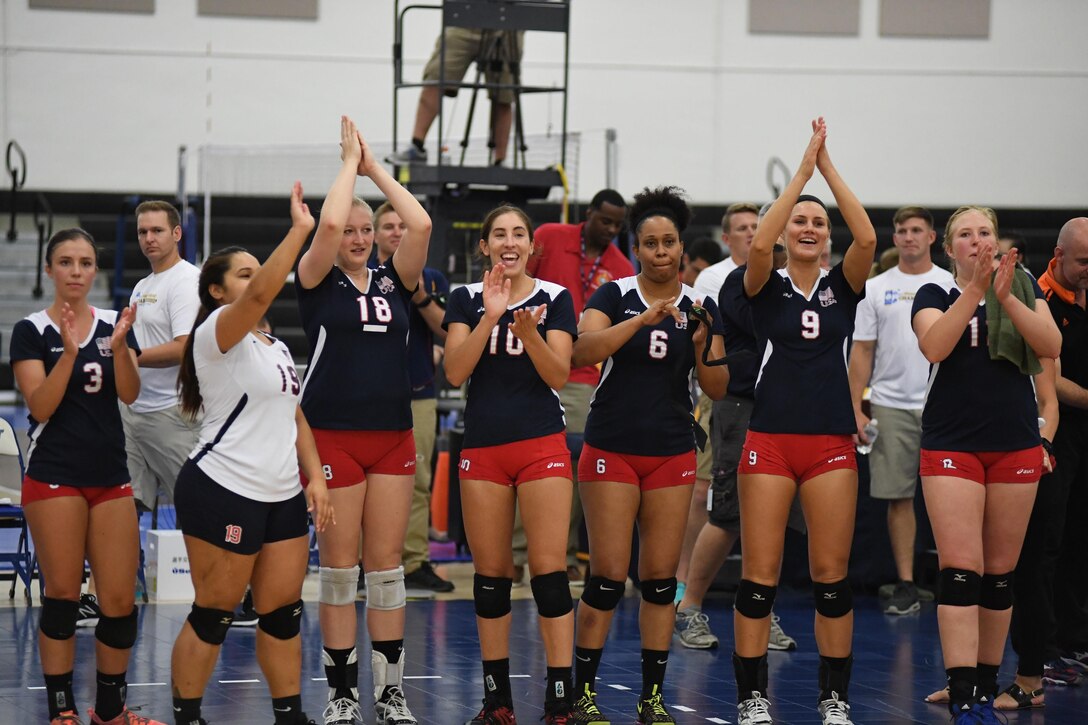 USA celebrates their victory over the Netherlands in match 8 of the 18th Conseil International du Sport Militaire (CISM) World Women’s Volleyball Military Championship on 7 June 2017 at Naval Station Mayport, Florida. USA will face China in the finals here at the Mayport Fitness Center on June 9th. (Photo by Petty Officer Timothy Schumaker, NPASE Southeast)