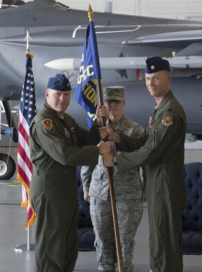 Lt Col. Gary Marlowe(Right) relinquishes command of the 389th Fighter Squadron to 366 Operations Group Commander Col Brian McCarthy May 22, 2017, at Mountain Home Air Force Base, Idaho. Marlowe and the T-Bolts recently returned from a successful deployment to southeast asia. (U.S. Air Force photo by Airman 1st Class Jeremy D. Wolff/Released)