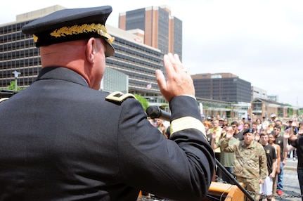 Maj. Gen. Troy D. Kok, commanding general of the U.S. Army Reserve’s 99th Regional Support Command, gives the oath of enlistment June 14 to almost 50 new Army recruits during the Stripes and Stars Festival celebrating the U.S. Army 242nd birthday at Independence Hall in Philadelphia.