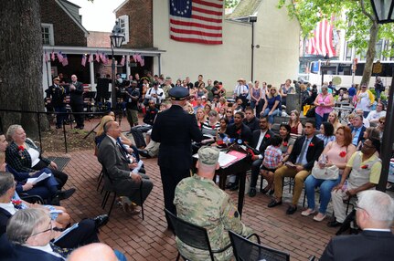 Maj. Gen. Troy D. Kok, commanding general of the U.S. Army Reserve’s 99th Regional Support Command, speaks June 14 at a naturalization ceremony at the Betsy Ross House in downtown Philadelphia. Thirteen individuals became U.S. citizens in an event that coincided with Flag Day and the 242nd Army birthday.