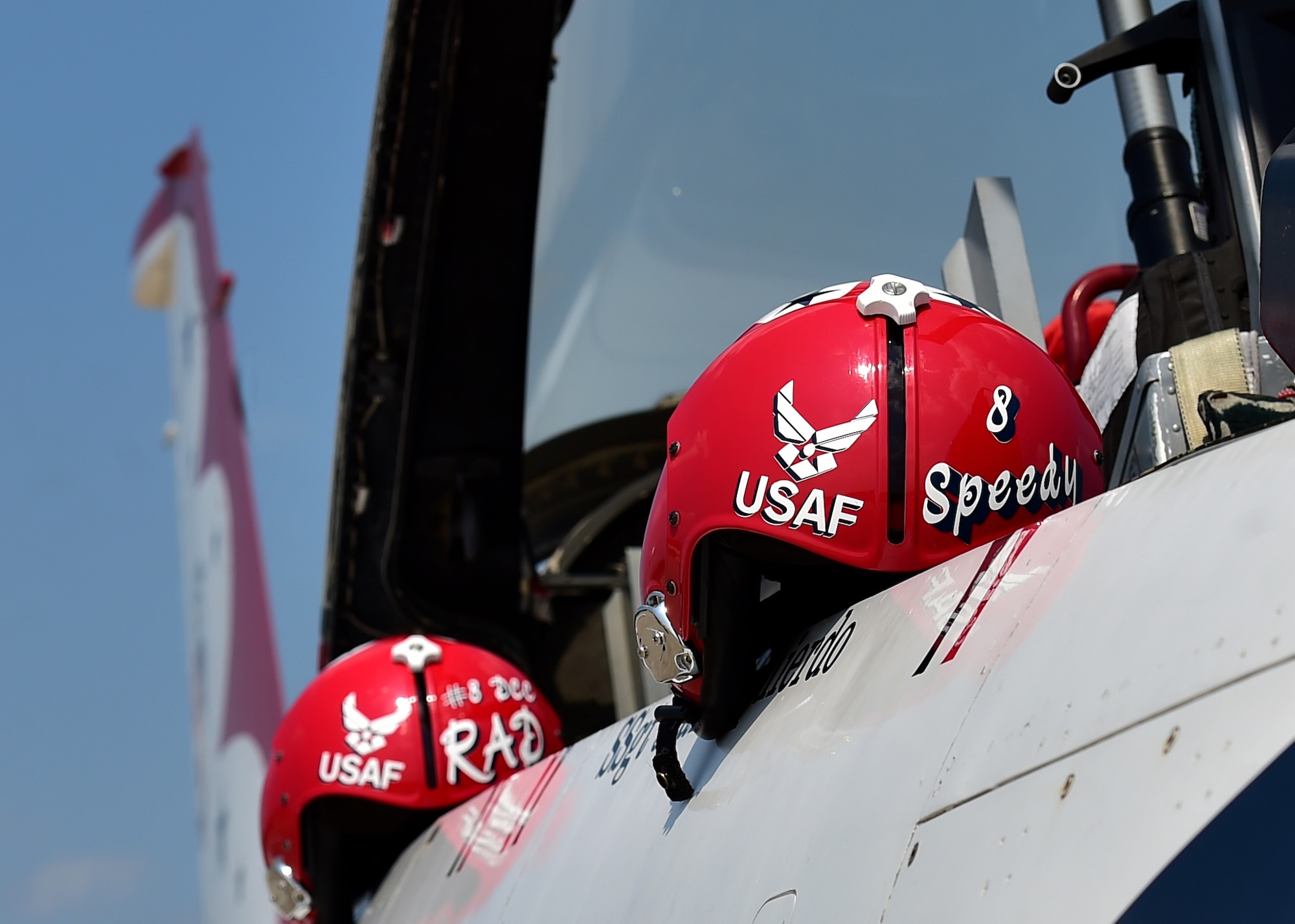 Flight helmets rest on the side of Thunderbird 8 shortly after it landed here, June 14, 2017. The U.S. Air Force Thunderbirds demonstration team is scheduled to perform at Thunder Over the Valley Air Show, June 17-18. (U.S. Air Force photo/Senior Airman Joshua Kincaid)
