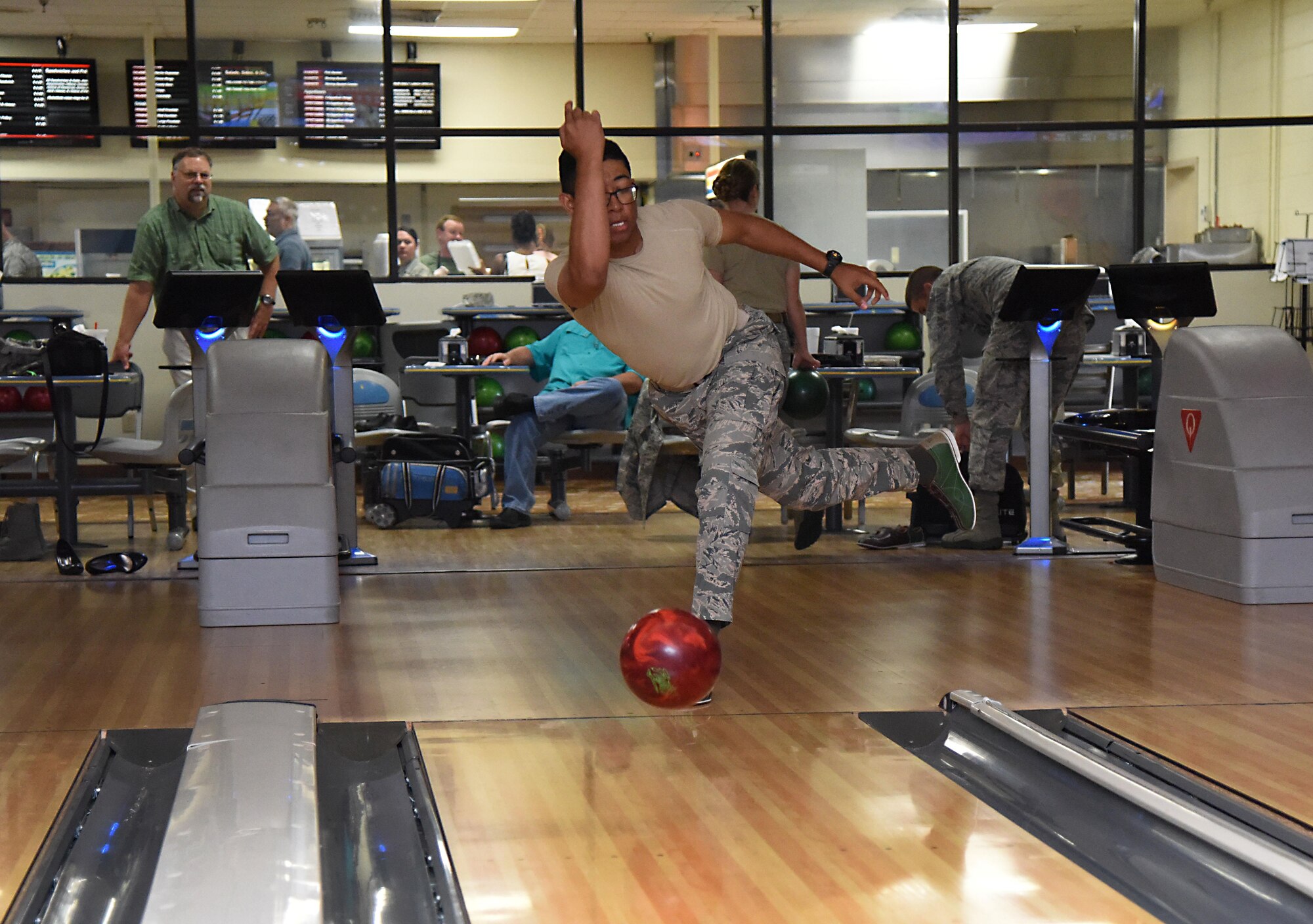 Senior Airman Cameron Spriggs, 81st Logistics Readiness Squadron logistics planner, participates in a bowling competition at Gaudé Lanes June 13, 2017, on Keesler Air Force Base, Miss. The competition was one of several Wingman Week events focusing on resiliency and teambuilding initiatives across the base. (U.S. Air Force photo by Kemberly Groue)