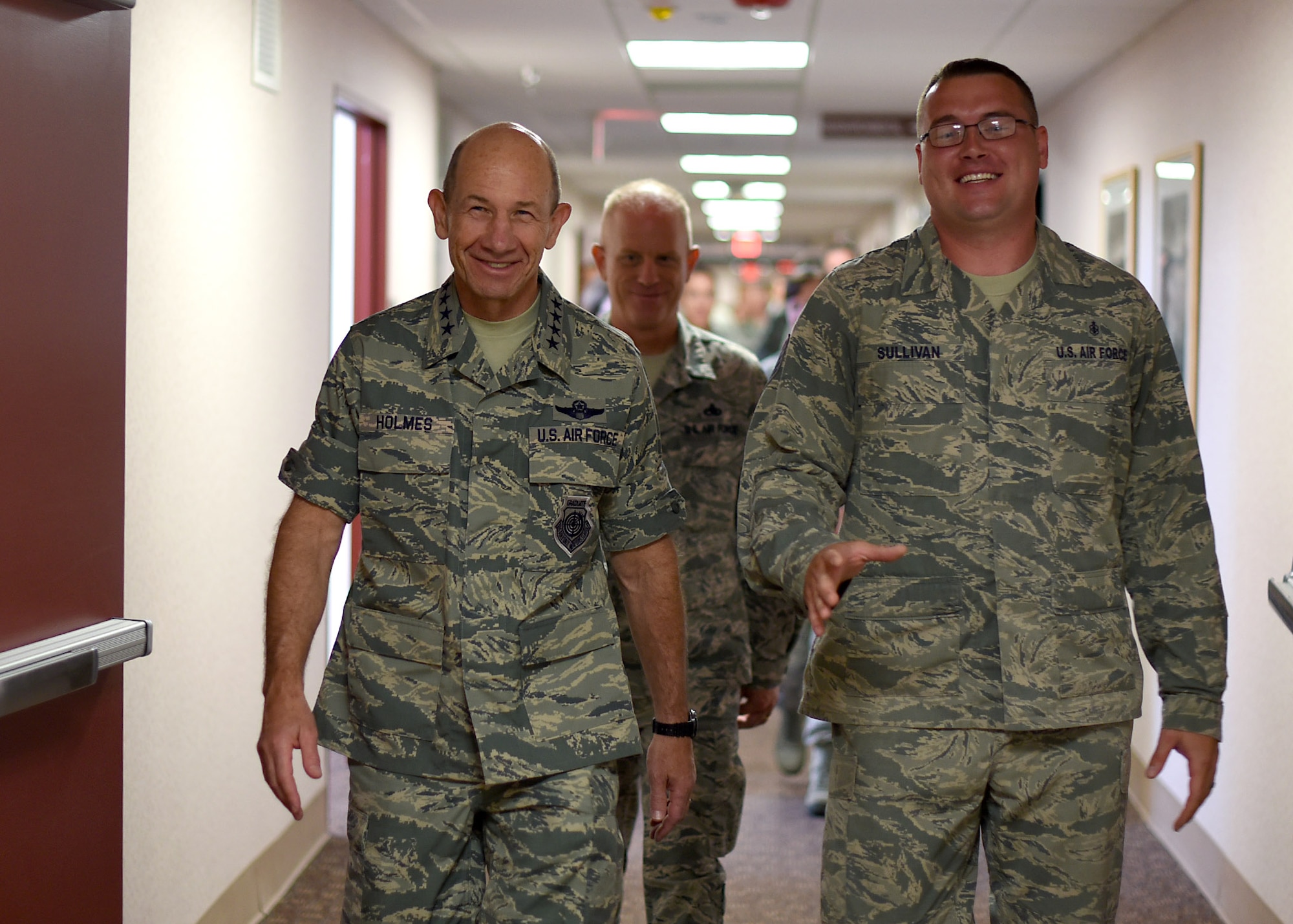 Tech. Sgt. Thomas Sullivan, 319th Medical Support Squadron laboratory NCO-in-charge, escorts Gen. Mike Holmes, Air Combat Command commander, during a tour of the 319th Medical Group June 15, 2017, on Grand Forks AFB, N.D. Holmes spent the day getting to know how the “Warriors of the North” meet the mission. (U.S. Air Force photo by Senior Airman Ryan Sparks)