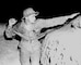 Marine private stands ready to throw a practice hand grenade from a trench at this Marine Corps Rifle Range where he is undergoing intensive recruit training. Camp Matthews, November 1945.