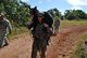 Staff Sgt. Jordan Lee Gunterman, 374th Security Forces Squadron military working dog handler, carries Stella, 374 SFS MWD, during the 2017 Security Forces Advanced Combat Skills Assessment June 9, 2017, at Andersen Air Force Base, Guam. Gunterman and Stella won first place for best military working dog team. (Curtesy photo by Capt. Kevin D. Collett) 