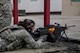 Airman 1st Class Kimberly Burton, 374th Security Forces Squadron patrolman, fires an M249 light machine gun during weapons training, May 25, 2017, at Yokota Air Base, Japan. The 374 SFS 2017 Security Forces Advanced Combat Skills Assessment team regularly practiced firing various weapons including the: M4 carbine assault rifle, M9 pistol, M249 light machine gun and the M203 grenade launcher in preparation for the Advanced Combat Skills Assessment competition at Andersen Air Force Base, Guam. (U.S. Air Force photo by Airman 1st Class Donald Hudson)