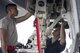 U.S. Air Force Staff Sgt. Dennis Franco and Senior Airman Devin Arden, 67th Aircraft Maintenance Unit F-15 Eagle dedicated crew chiefs, perform maintenance on hydraulic systems of an F-15 June 13, 2017, at Kadena Air Base, Japan. The Eagle's air superiority is achieved through a mixture of unprecedented maneuverability and acceleration, range, weapons and avionics. (U.S. Air Force photo by Senior Airman Omari Bernard)