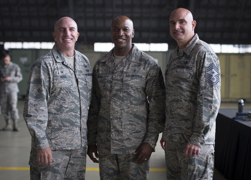 From left, Col. Kenneth E. Moss, 374th Airlift Wing commander, Chief Master Sgt. of the Air Force Kaleth O. Wright and Chief Master Sgt. Christopher M. Yevchak, 374 AW command chief master sergeant, pose for a photo, June 13, 2017, at Yokota Air Base, Japan. Together, they highlighted the importance of Yokota’s airlift mission throughout the Indo-Asia Pacific region. (U.S. Air Force photo by Airman 1st Class Juan Torres)