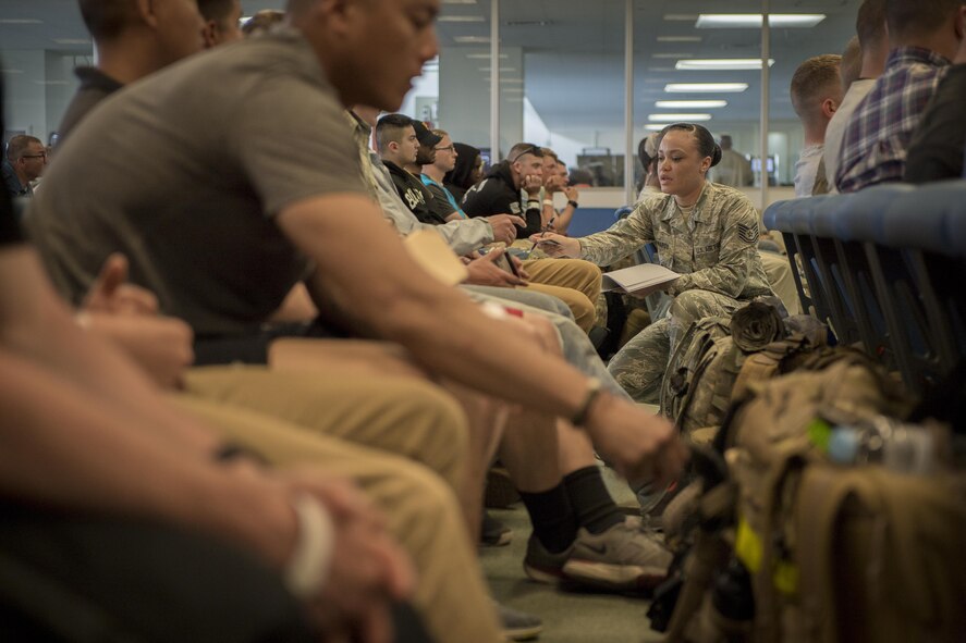 Noncombatant Evacuation Operations exercise participants wait to be processed into Japan, June 6, 2017, at Yokota Air Base, Japan. The NEO exercise, Focused Passage 2017, was designed to exercise NEO procedures for an evacuation of U.S. citizens from the Republic of Korea. (U.S. Air Force photo by Airman 1st Class Donald Hudson)