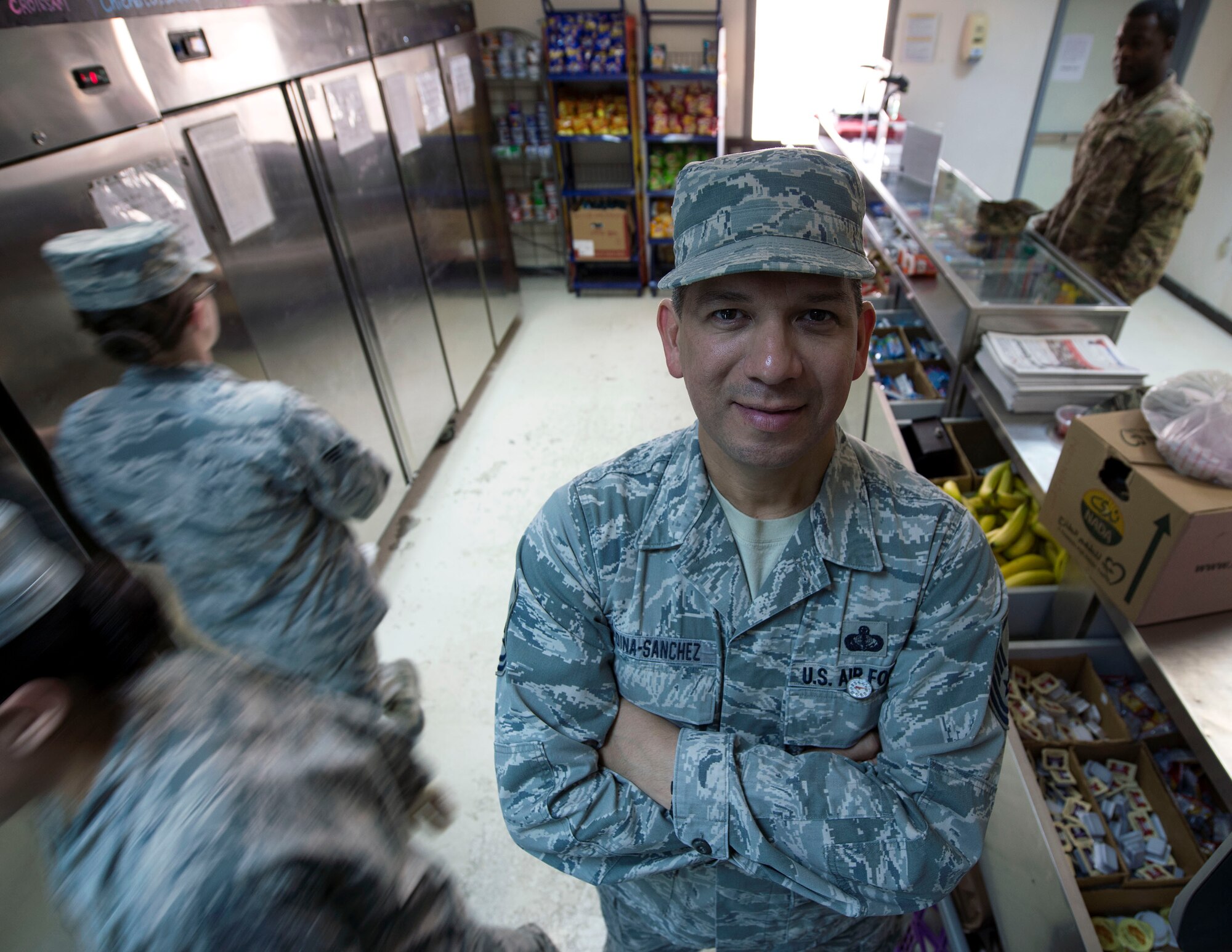 U.S. Air Force Master Sgt. Adrian Medina Sanchez, manager of the Hot Grab-n-Go kitchen with the 379th Expeditionary Force Support Squadron, poses for a photograph at Al Udeid Air Base, Qatar, May 25, 2017. Medina Sanchez will be retiring from the Air Force after twenty four years of service which he never thought would turn into a career. (U.S. Air Force photo by Tech. Sgt. Amy M. Lovgren)