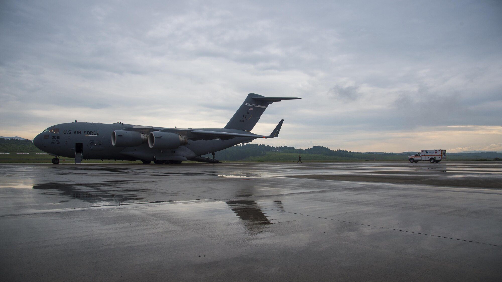 A C-17 Globemaster III sits on the Aomori Airport runway during an aeromedical evacuation in Aomori, Japan, June 15, 2017. Once the C-17 landed, a neonatal intensive care unit team from the U.S. Navy hospital, Okinawa, Japan, joined 35th Medical Group personnel to prepare the newborn for the flight. (U.S. Air Force photo by Senior Airman Deana Heitzman)