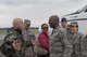 Col. Kenneth Moss, 374th Airlift Wing commander, welcomes Chief Master Sgt. of the Air Force Kaleth O. Wright and his wife, Tonya, June 8, 2017, at Yokota Air Base, Japan. Wright has been visiting Pacific Air Forces bases to interact with Airmen and get their feedback. 