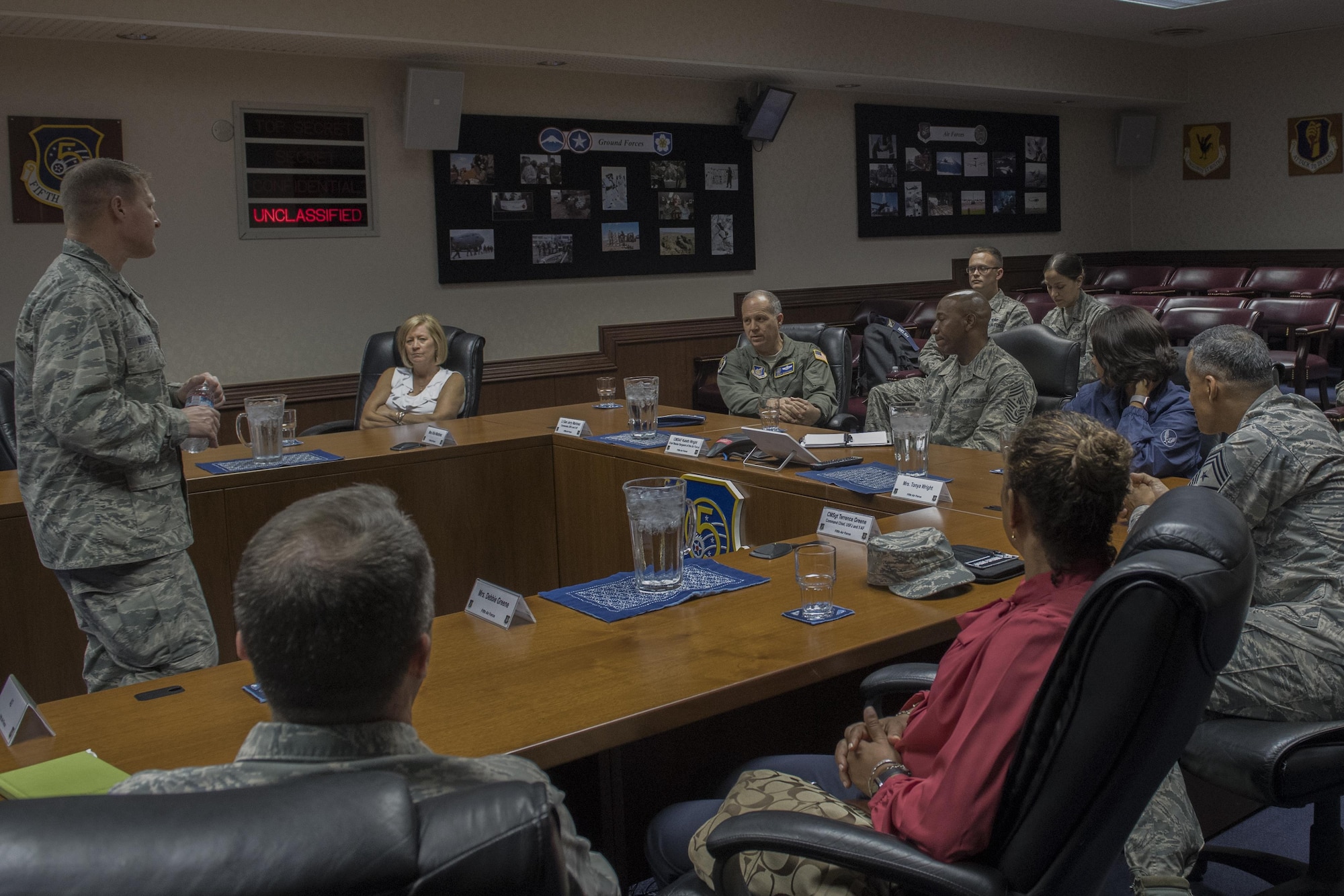 Lt. Gen. Jerry P. Martinez, United States Forces, Japan, and 5th Air Force commander and Chief Master Sgt. of the Air Force Kaleth O. Wright sit in a briefing, June 8, 2017, at Yokota Air Base, Japan. Wright has been visiting Pacific Air Forces bases to interact with Airmen and get their feedback. 