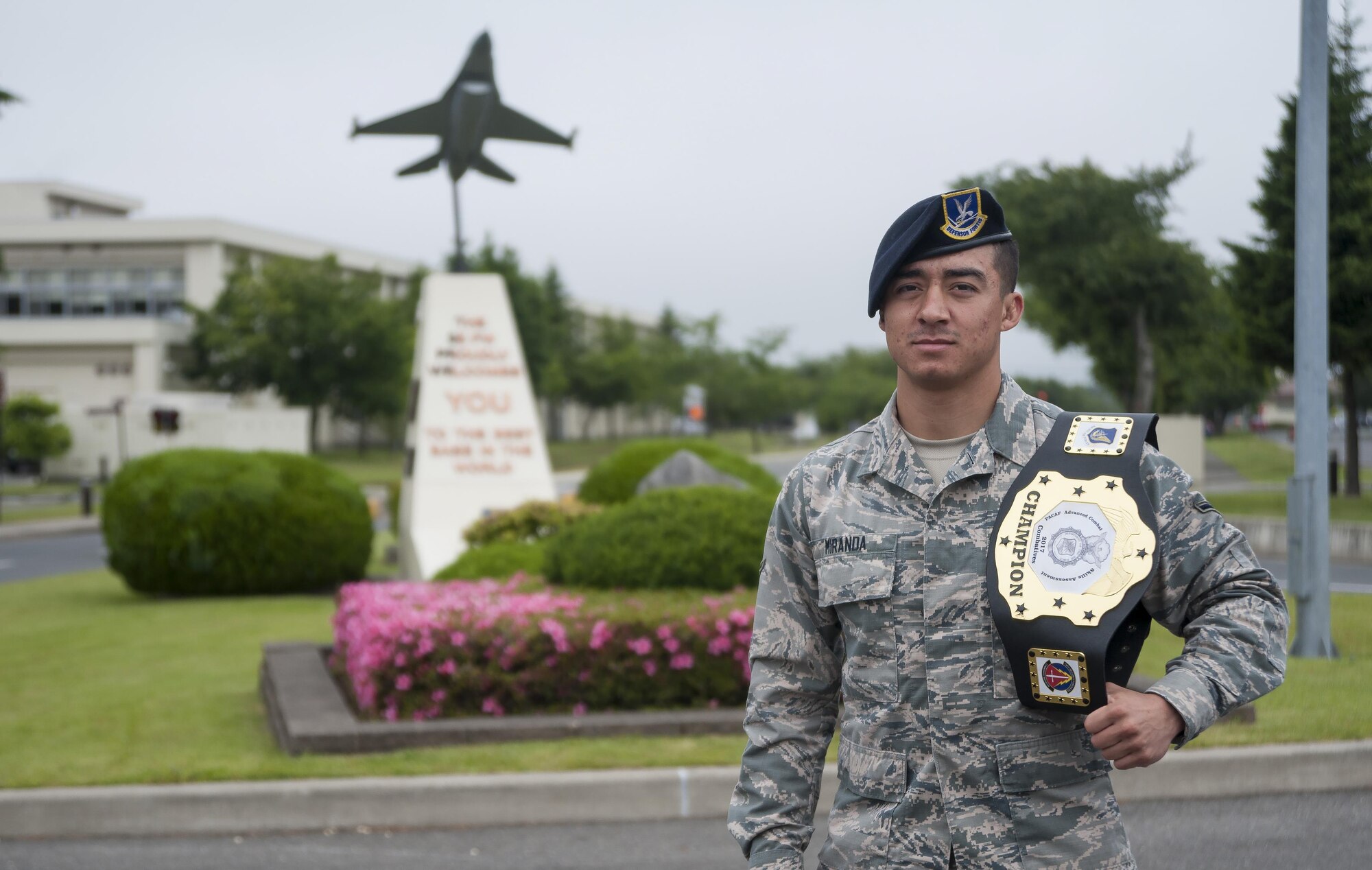 U.S. Air Force Airman Sergio Miranda, a 35th Security Forces Squadron entry controller, pauses for a photo at Misawa Air Base, Japan, June 16, 2017. Miranda won the belt and title of the 2017 Combatives Champion of the second annual Security Forces Advanced Combat Skills Assessment held at the Security Forces Regional Training Center at Andersen Air Force Base, Guam, June 4 to 9. The combative portion was the only individual event based out of five events. (U.S. Air Force photo by Staff Sgt. Melanie Hutto)