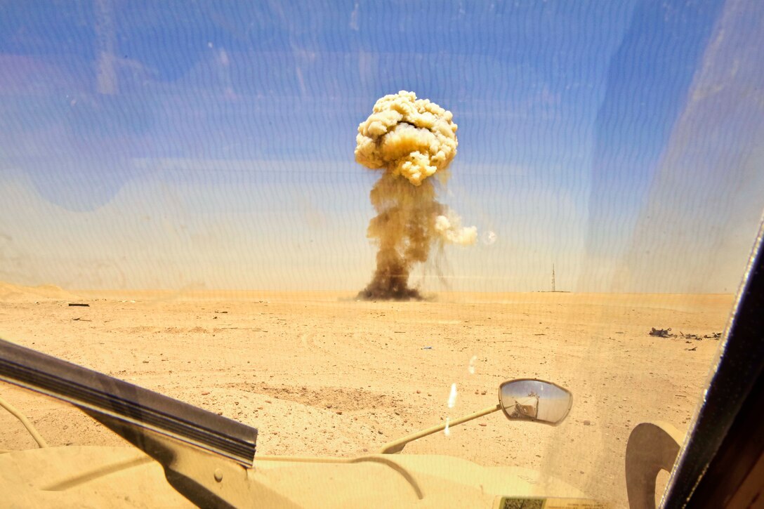 Airmen and Marines detonate a control blast during an explosive ordnance disposal operation in Southwest Asia, June 6, 2017. Air Force photo by Senior Airman Ramon A. Adelan