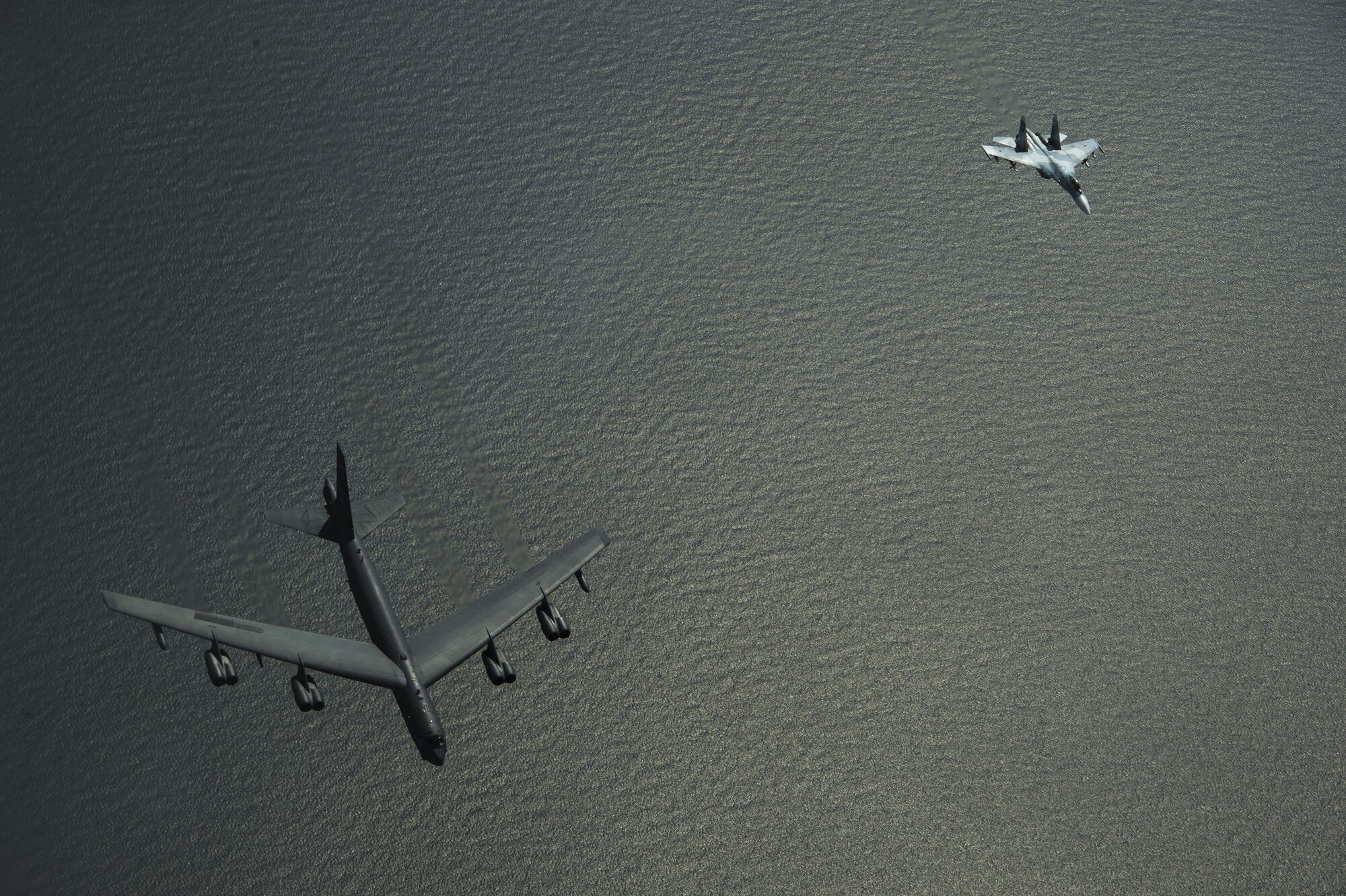 A Russian Su-27 Flanker intercepts a U.S. Air Force B-52H Stratofortress, while participating in Baltic Operations over the Baltic Sea, June 9, 2017. The exercise is designed to enhance flexibility and interoperability, to strengthen combined response capabilities, as well as demonstrate resolve among allied and partner nations forces to ensure stability in, and defend, the Baltic Sea region. Flight intercepts are regular occurrences, and the vast majority are conducted in a safe and professional manner. (U.S. Air Force photo/Staff Sgt. Jonathan Snyder)