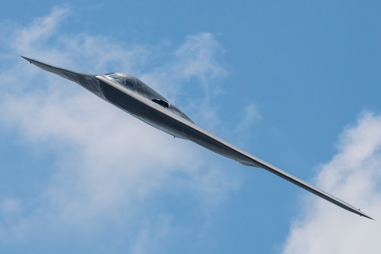 A 509th Bomb Wing B-2 Spirit conducts a fly-by during the Scott Air Force Base 2017 air show and open house June 11, 2017, which celebrates the base’s 100th anniversary. The B-2 is a multi-role bomber capable of delivering both conventional and nuclear munitions and represents a major milestone in the bomber modernization program. With a crew of two pilots, this aircraft brings a massive firepower to bear, in a short time, anywhere on the globe through impenetrable defenses. (U.S. Air Force photo/Senior Airman Tristin English)