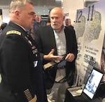 Michael A. Dubick, Ph.D., chief of the U.S. Army Institute of Surgical Research Damage Control Resuscitation Research Program at Joint Base San Antonio-Fort Sam Houston, explains the function and capabilities the SAM Junctional Tourniquet to Gen. Mark A. Milley, Army Chief of Staff.