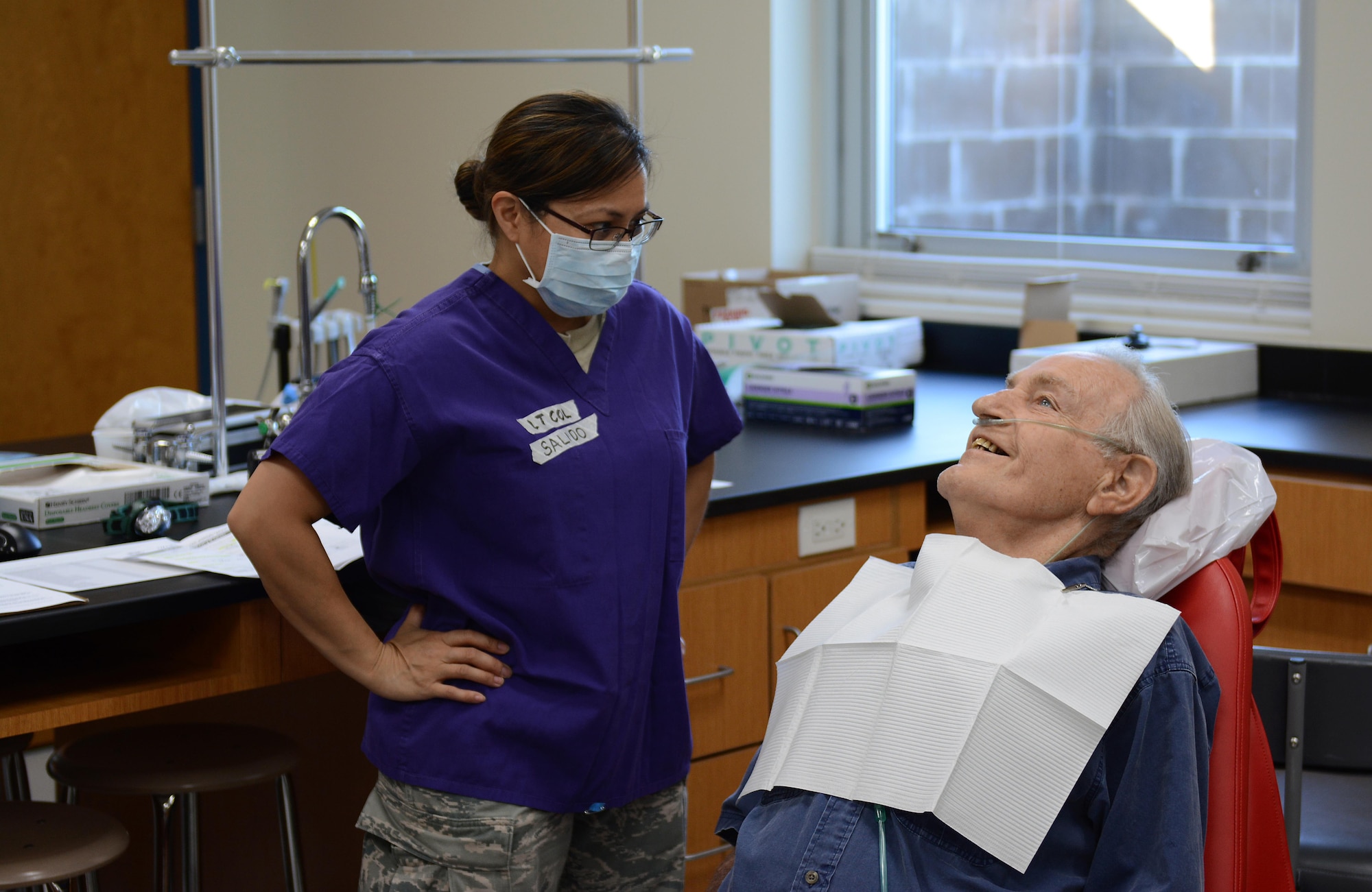Air Force Lt. Col. Joan Salido, a dentist from the 445th Aerospace Medicine Squadron of Wright-Patterson Air Force Base, Ohio, preps a patient during Innovative Readiness Training at Mountain Home, Ark., June 12, 2017. The IRT program allows active-duty, guard and reserve members to volunteer for real-world training opportunities through engineering, veterinarian, medical, and construction projects that benefit the sometimes-forgotten citizens of American communities in need. (U.S. Air National Guard photo by Staff Sgt. Carlynne DeVine)